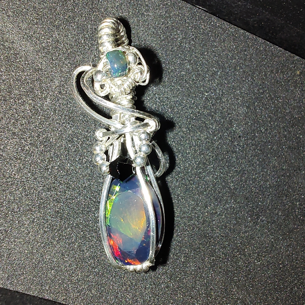 Sterling Silver Wire Wrapped Genuine Black Faceted Ethiopian Opal Pendant